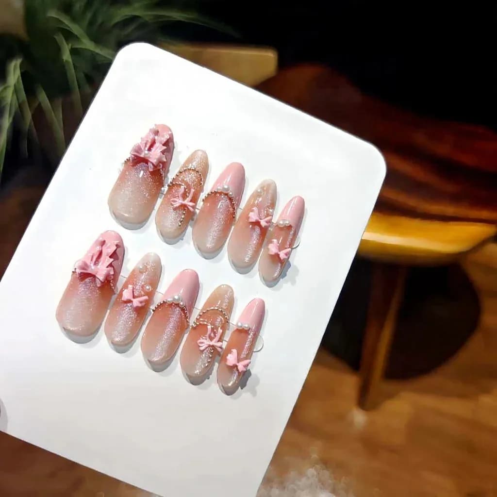 Unghie Finte Adesive Stiletto Lunghe Occhio di Gatto con Fiocco e Pizzo Rosa