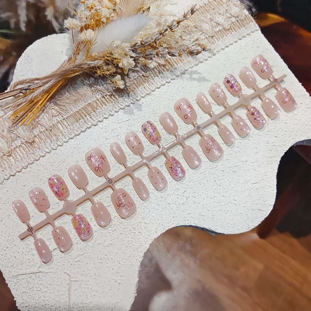 Unghie Finte Farfalla Rosa con Glitter e Fiocco